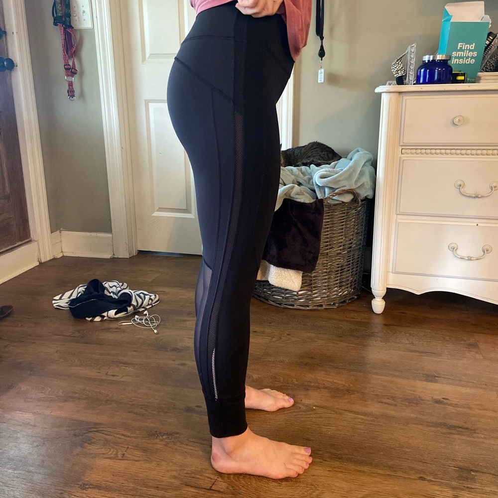 Black Lululemon size 6 tights with mesh detail